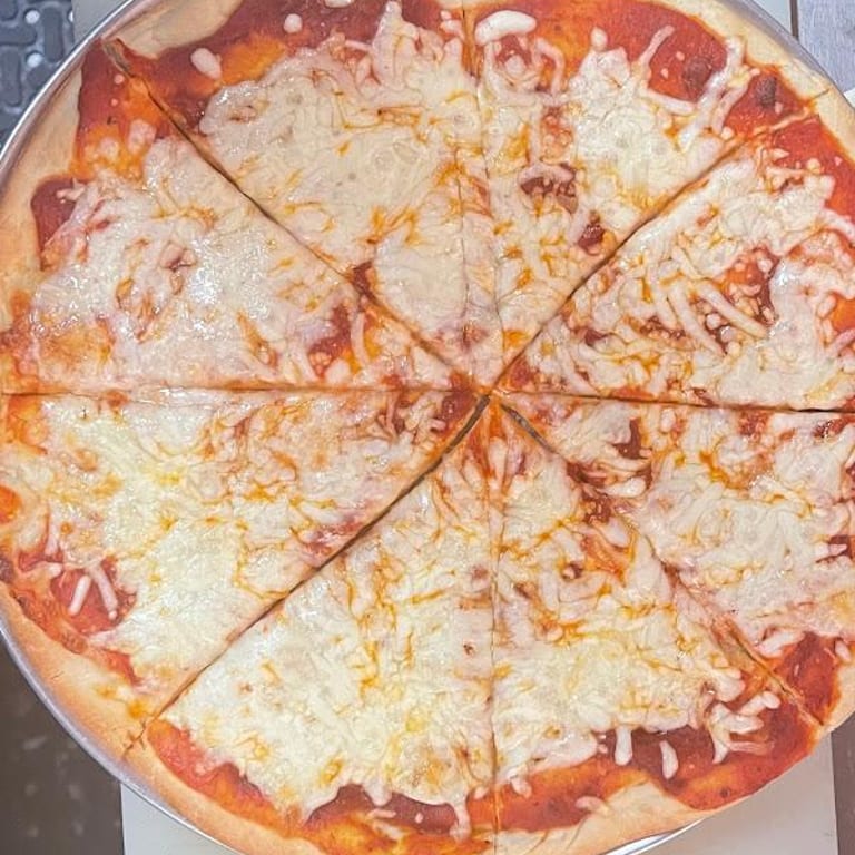 Indulge in Our Cheese Pizza